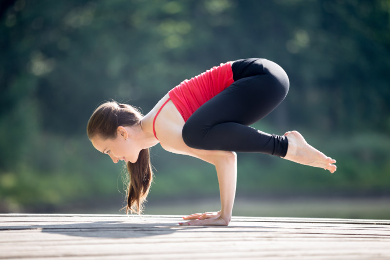 Asian Woman Practicing Yoga in Prep Poses for Side Crane Pose for Parsva  Bakasana on the Mat in Outdoor Park Stock Image - Image of grass, balance:  245566441
